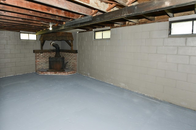 129 Tomlinson Ave, Plainville, CT 06062 - below grade area with plenty of natural light and a wood stove
