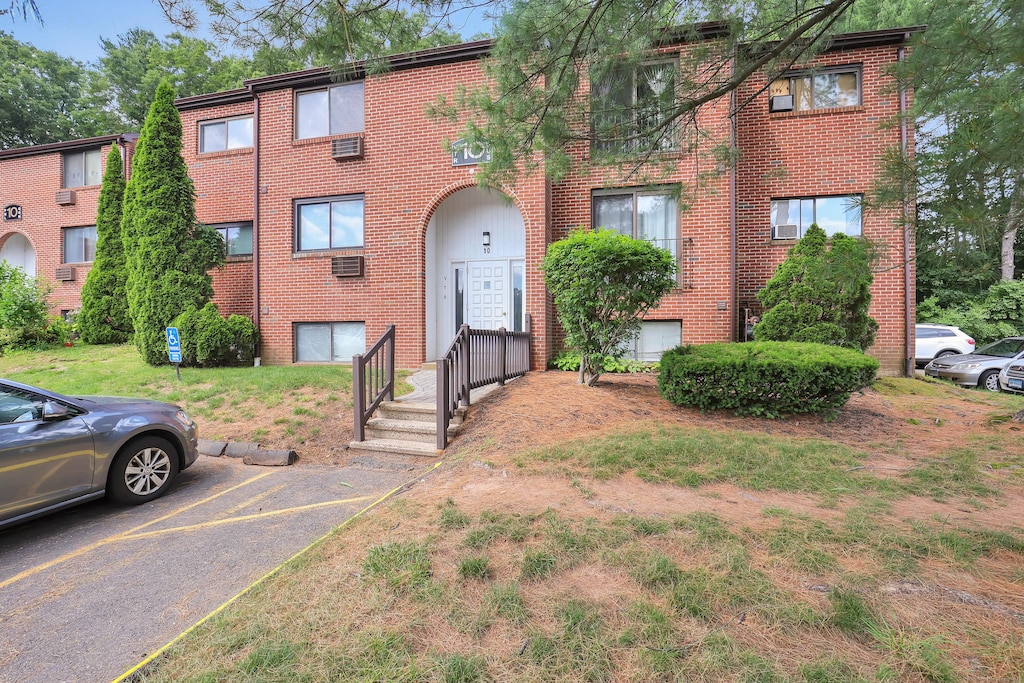 10 Darling St Apt T, Southington, CT 06489 - townhome / multi-family property featuring brick siding and uncovered parking