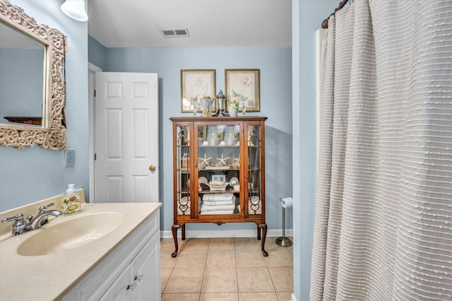 18 Overlook Ave, Middletown, CT 06457 - bathroom with vanity, tile patterned floors, and a shower with shower curtain
