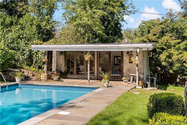 7 Calvin Rd, Wilton, CT 06897 - outdoor pool featuring a storage structure, an outbuilding, and a patio area