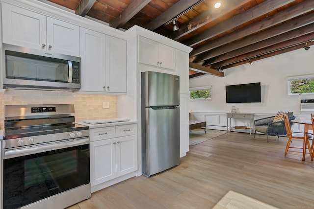 7 Calvin Rd, Wilton, CT 06897 - kitchen with stainless steel appliances, rail lighting, a wooden ceiling with exposed beams, tasteful backsplash, and light wood-type flooring