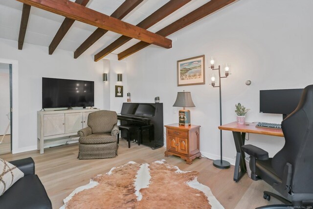 7 Calvin Rd, Wilton, CT 06897 - living room featuring a desk, light wood finished floors, and beam ceiling