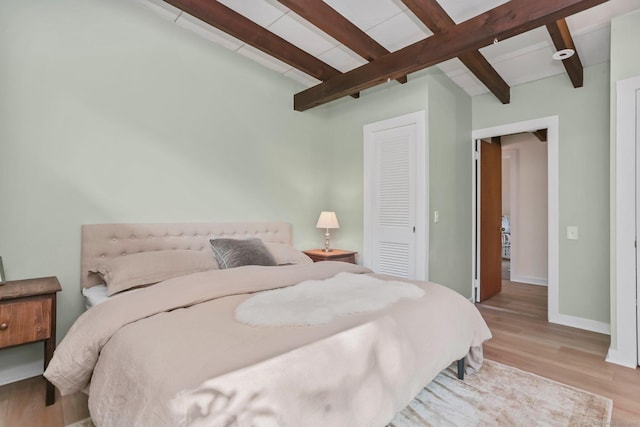 7 Calvin Rd, Wilton, CT 06897 - bedroom with beamed ceiling, wood finished floors, and a closet