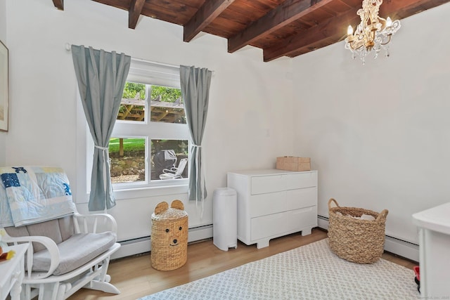 7 Calvin Rd, Wilton, CT 06897 - bedroom featuring a wood ceiling with exposed beams, a chandelier, wood finished floors, and a baseboard heating unit