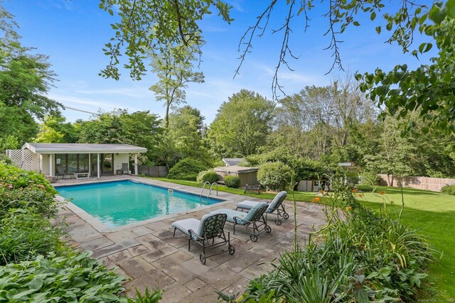 7 Calvin Rd, Wilton, CT 06897 - view of pool featuring a patio area and an outbuilding