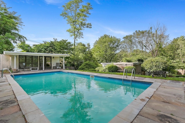 7 Calvin Rd, Wilton, CT 06897 - outdoor pool with a hot tub and view of wooded area