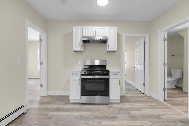 85 Twiss St, Meriden, CT 06450 - kitchen featuring stainless steel electric range oven, baseboard heating, under cabinet range hood, light countertops, and light wood-style floors