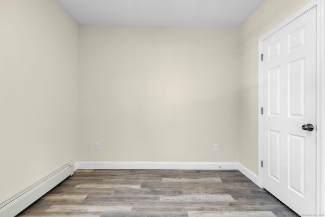 85 Twiss St, Meriden, CT 06450 - unfurnished room featuring baseboard heating and wood finished floors