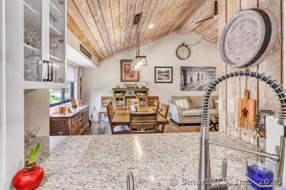 92 Seminole Ln Unit B, Stratford, CT 06614 - dining room with wood ceiling, vaulted ceiling, and wood finished floors
