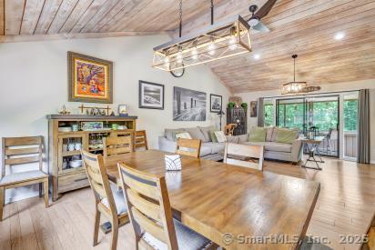 92 Seminole Ln Unit B, Stratford, CT 06614 - dining space with wooden ceiling, wood finished floors, and a chandelier