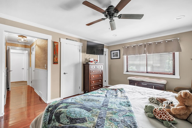 92 Seminole Ln Unit B, Stratford, CT 06614 - bedroom with ornamental molding, wood finished floors, and a ceiling fan