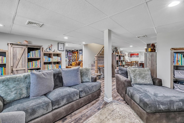 92 Seminole Ln Unit B, Stratford, CT 06614 - living area featuring wood finished floors, stairway, a paneled ceiling, and recessed lighting