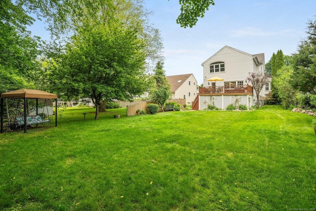 14 Maple St, Darien, CT 06820 - view of green lawn with stairway, a wooden deck, and a gazebo