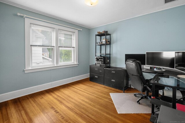 14 Maple St, Darien, CT 06820 - office area with light wood-style flooring and crown molding
