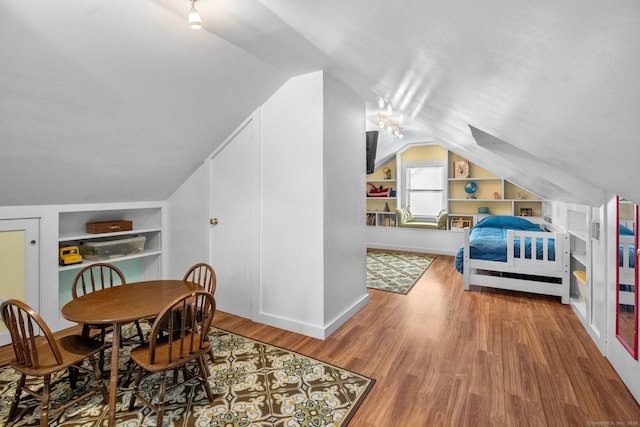 14 Maple St, Darien, CT 06820 - dining room featuring built in features, lofted ceiling, and wood finished floors