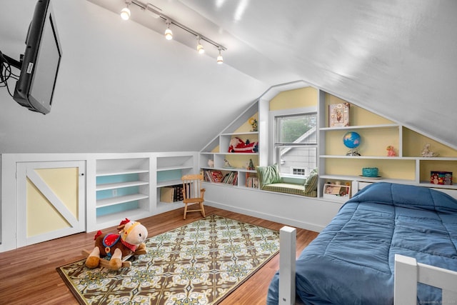 14 Maple St, Darien, CT 06820 - bedroom featuring lofted ceiling, wood finished floors, and track lighting