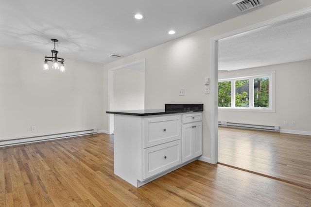 66 Pinnacle Rd, Bristol, CT 06010 - kitchen with a baseboard radiator, white cabinets, light wood-style floors, a chandelier, and recessed lighting