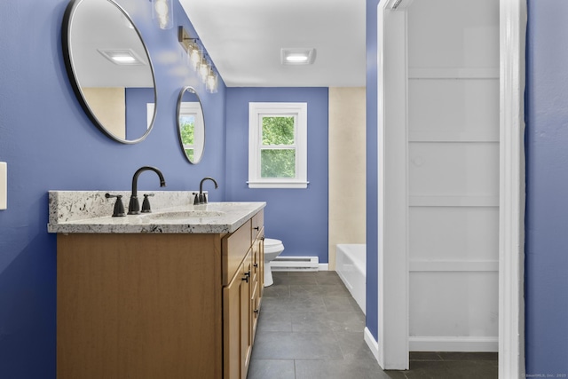 66 Pinnacle Rd, Bristol, CT 06010 - full bathroom featuring a baseboard radiator, double vanity, a bathtub, built in shelves, and tile patterned flooring