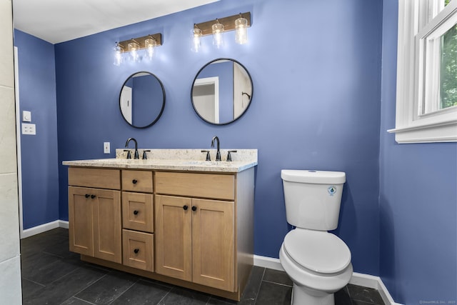 66 Pinnacle Rd, Bristol, CT 06010 - bathroom featuring double vanity and tile patterned floors