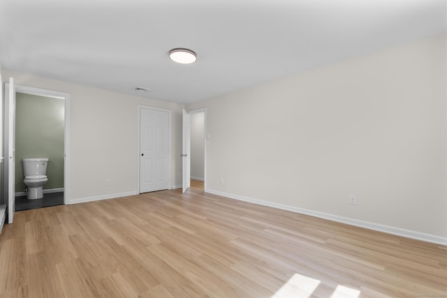 66 Pinnacle Rd, Bristol, CT 06010 - unfurnished bedroom with light wood finished floors and connected bathroom