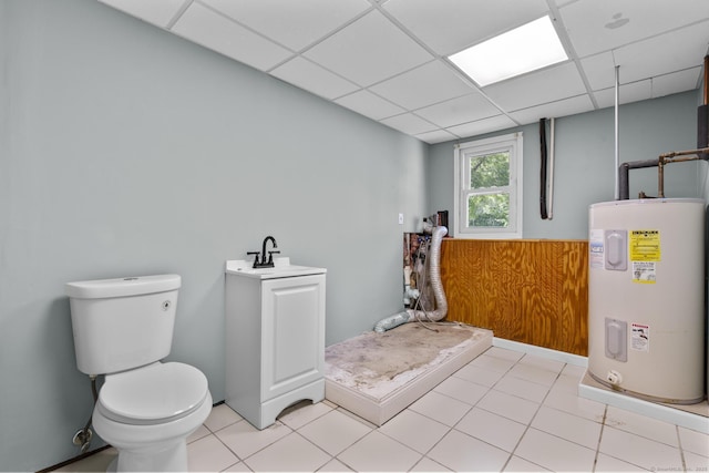 66 Pinnacle Rd, Bristol, CT 06010 - bathroom featuring electric water heater, a paneled ceiling, and tile patterned floors