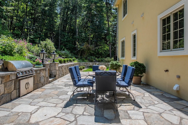 2 Barberry Ln, Farmington, CT 06032 - view of patio featuring outdoor dining space and exterior kitchen