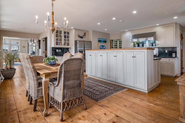 850 Noank Rd, Groton, CT 06355 - dining room featuring light wood finished floors, a chandelier, and recessed lighting