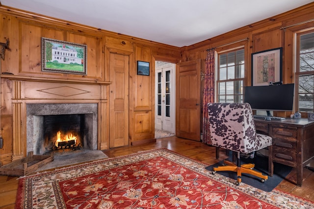 850 Noank Rd, Groton, CT 06355 - office area featuring hardwood / wood-style floors, wood walls, and a fireplace