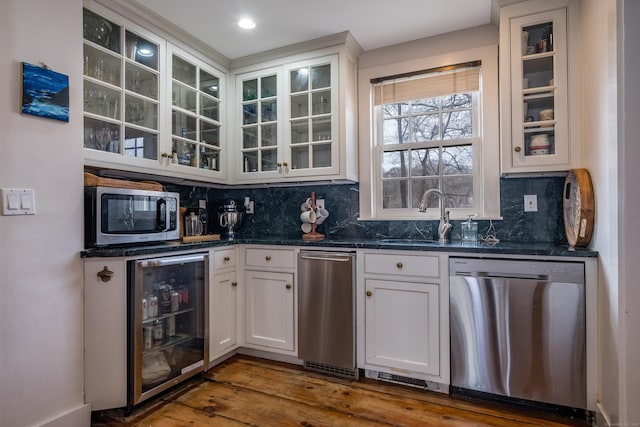 850 Noank Rd, Groton, CT 06355 - indoor wet bar with stainless steel appliances, wine cooler, backsplash, and dark wood finished floors