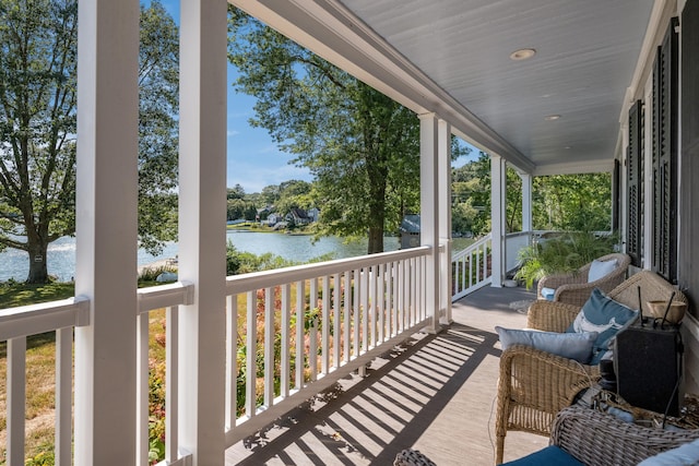 850 Noank Rd, Groton, CT 06355 - porch featuring a water view and view of wooded area