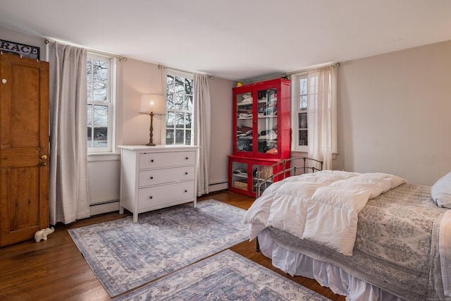 850 Noank Rd, Groton, CT 06355 - bedroom with baseboard heating and wood finished floors
