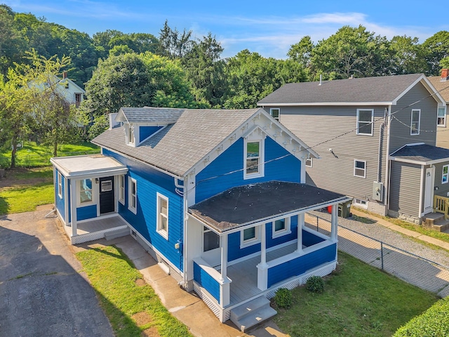 300 Central Ave, Norwich, CT 06360 - view of front facade featuring covered porch, roof with shingles, and asphalt driveway
