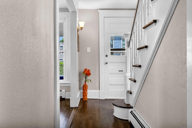 300 Central Ave, Norwich, CT 06360 - entryway with a textured wall, wood finished floors, a baseboard heating unit, stairway, and a baseboard radiator