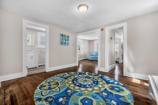 300 Central Ave, Norwich, CT 06360 - foyer with hardwood / wood-style floors and a baseboard radiator
