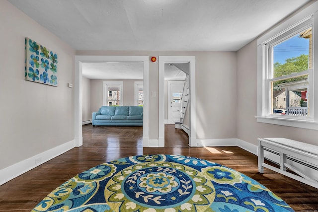 300 Central Ave, Norwich, CT 06360 - sitting room featuring healthy amount of natural light, wood finished floors, and a baseboard radiator