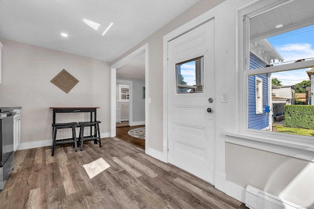 300 Central Ave, Norwich, CT 06360 - foyer entrance featuring wood finished floors, a baseboard heating unit, and recessed lighting