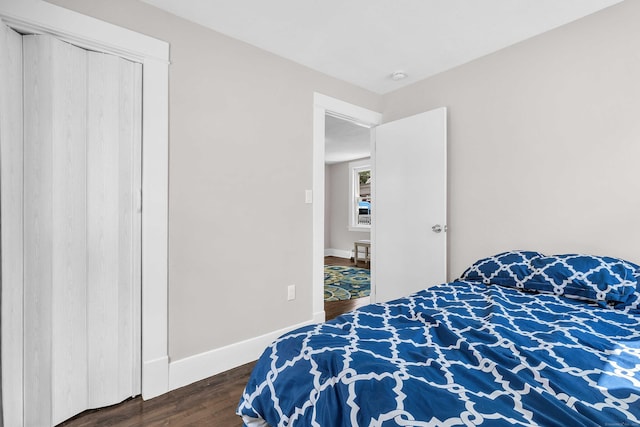 300 Central Ave, Norwich, CT 06360 - bedroom featuring dark wood-style floors and baseboards