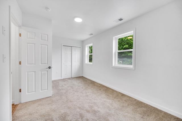 339 Main St, Wallingford, CT 06492 - unfurnished bedroom with carpet floors and a closet