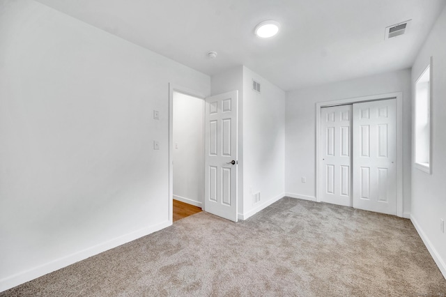 339 Main St, Wallingford, CT 06492 - unfurnished bedroom featuring carpet and a closet