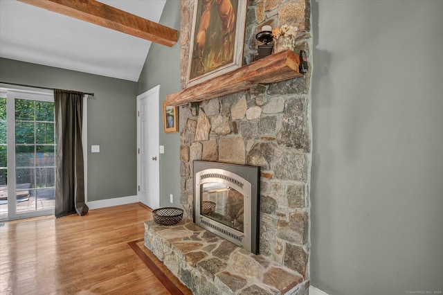 42 Woodmont Cir, East Haddam, CT 06423 - detailed view of a fireplace, beam ceiling, and wood finished floors