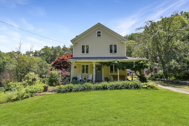 279 Pratt St, Winchester, CT 06098 - view of front facade with a porch, a front yard, and driveway