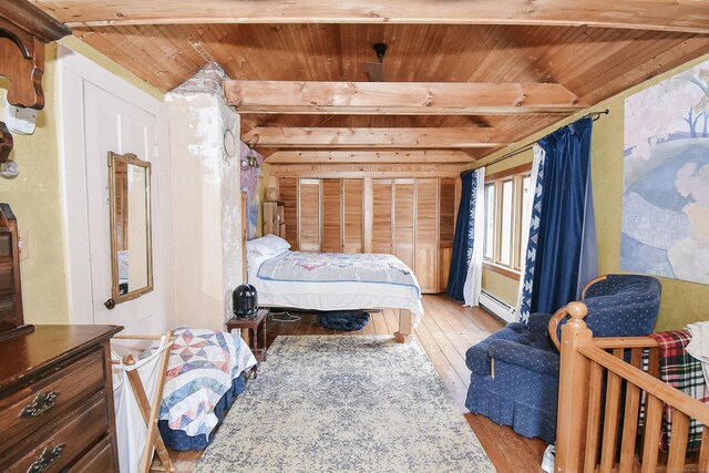279 Pratt St, Winchester, CT 06098 - bedroom featuring a wooden ceiling with exposed beams, a baseboard radiator, and light wood finished floors