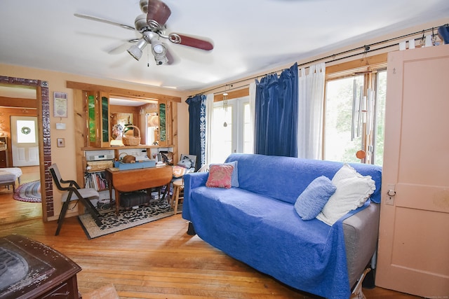 279 Pratt St, Winchester, CT 06098 - living room with light wood finished floors, plenty of natural light, and ceiling fan