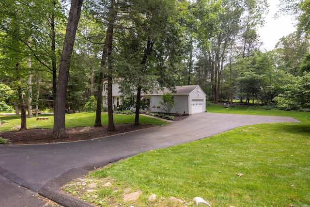 1 Whippoorwill Ln, Brookfield, CT 06804 - view of home's community featuring a lawn, driveway, and view of wooded area
