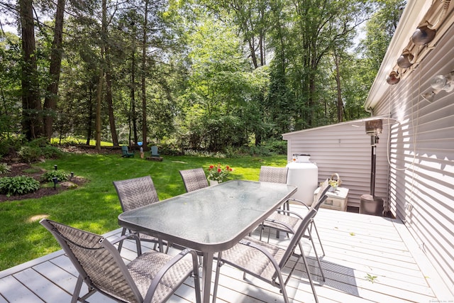 1 Whippoorwill Ln, Brookfield, CT 06804 - deck with outdoor dining space, a lawn, and view of scattered trees