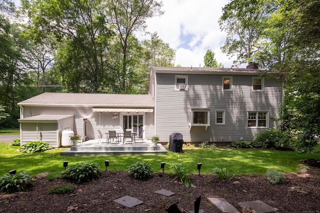 1 Whippoorwill Ln, Brookfield, CT 06804 - rear view of property with a deck, a chimney, and a lawn