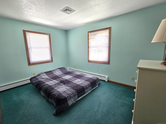 51 Peppermint Ln, Bristol, CT 06010 - carpeted bedroom with baseboard heating and a textured ceiling