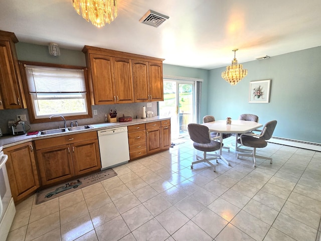 51 Peppermint Ln, Bristol, CT 06010 - kitchen featuring white dishwasher, a chandelier, baseboard heating, brown cabinets, and tasteful backsplash