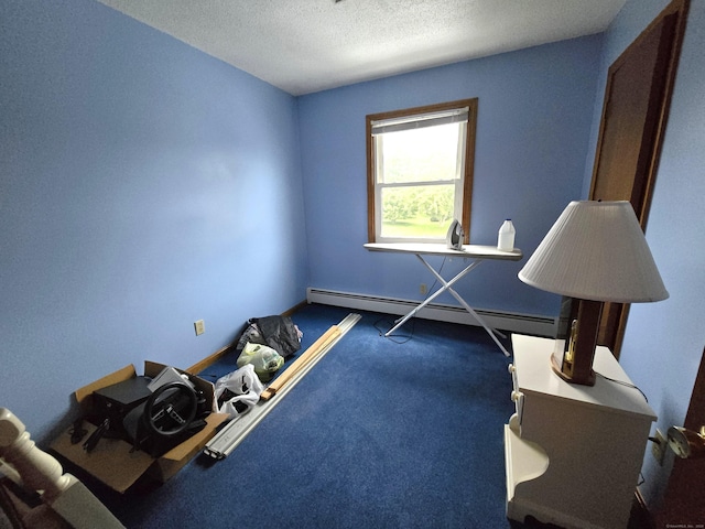 51 Peppermint Ln, Bristol, CT 06010 - miscellaneous room featuring a baseboard heating unit, a textured ceiling, and carpet floors