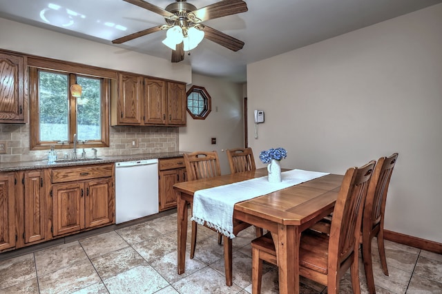 55 Mary Ellen Dr, Milford, CT 06460 - dining area featuring a ceiling fan and baseboards